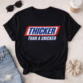 Thicker Than a Snicker Graphic Tee – Funny Thick Girl Shirt – Trendy Streetwear T-Shirt