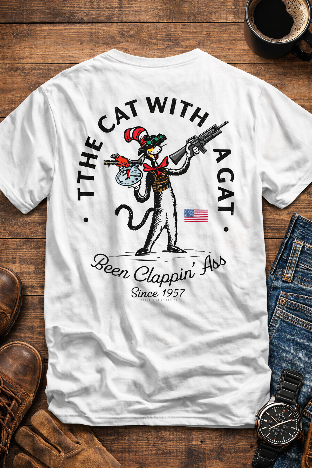 The Cat With A Gat Funny Graphic Tee – “Been Clappin’ Ass Since 1957” Cat Shirt